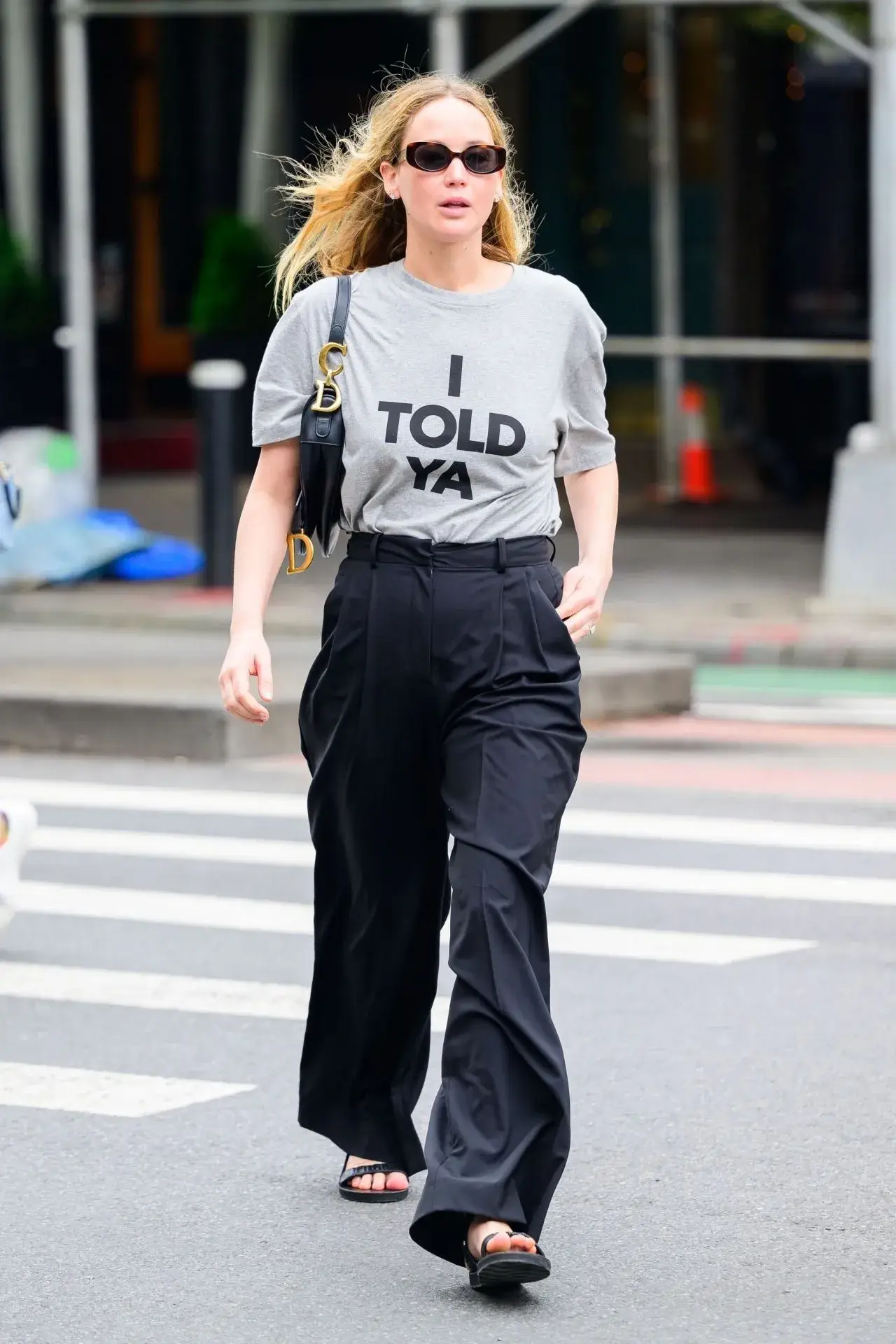 JENNIFER LAWRENCE SEEN IN LOEWE T SHIRT BLACK PANT NEW YORK CITY STREET